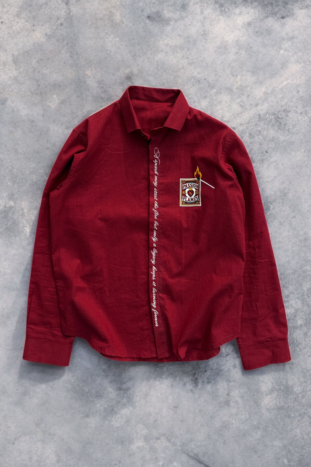 Red jacket with a logo on a gray concrete surface
