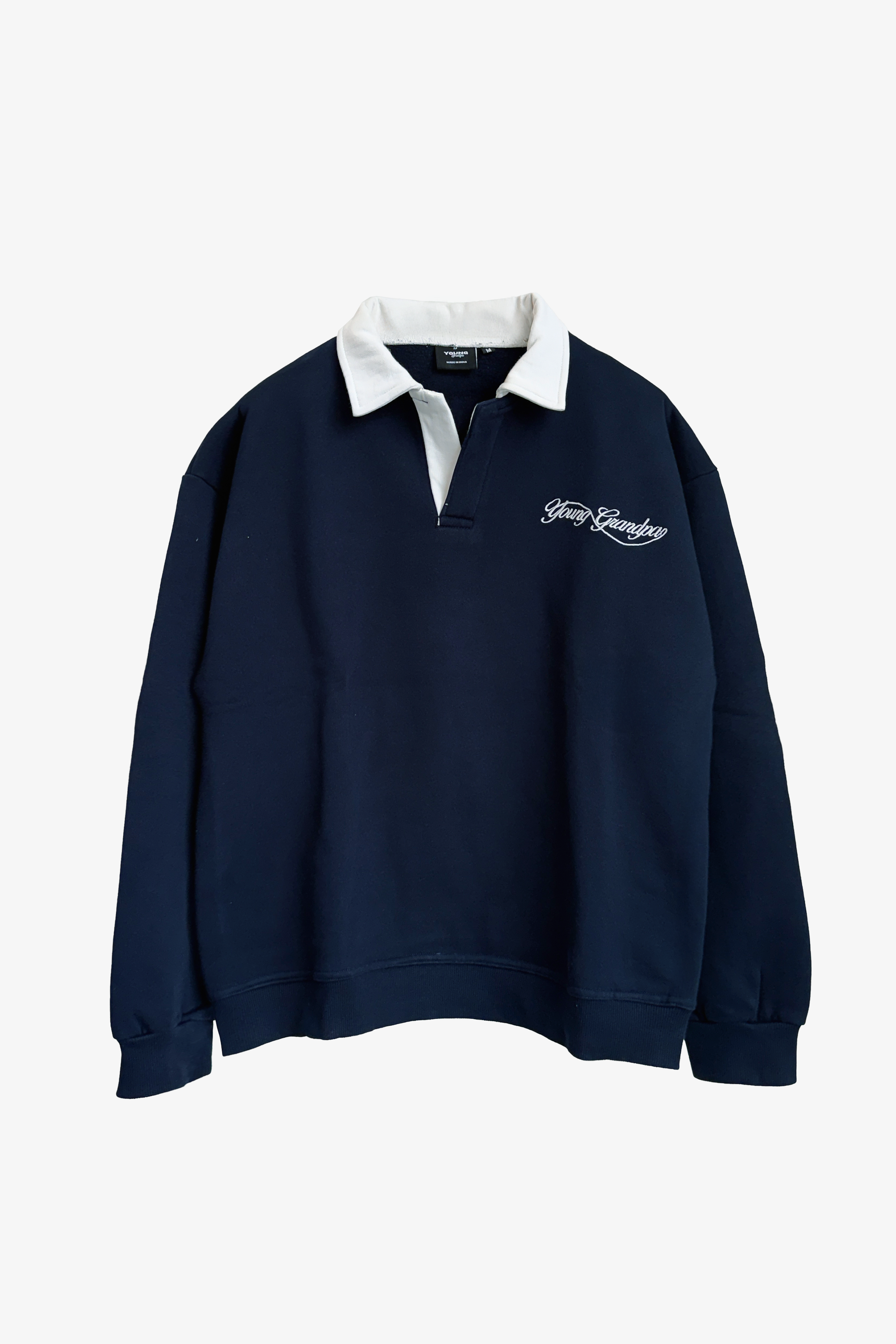 Navy blue sweatshirt with white collar and embroidered logo on a light gray background